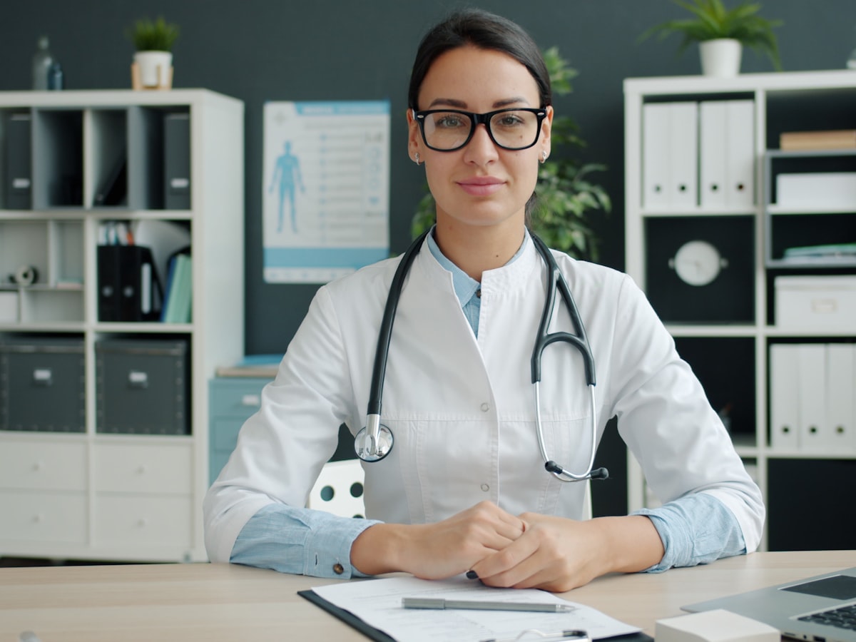 Doctor at her desk in a modern clinic office